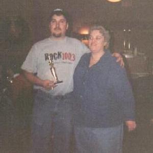 Bobby with trophy and Gail, 2000 tournament
