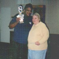Burt with trophy and Gail, 2001 tournament