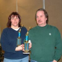 Denise and Curt with trophies, 2003 tournament