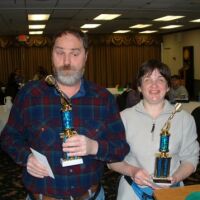 Don and Barb O with trophies, 2003 tournament