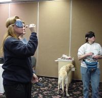 Lisa throwing, Barb O watching, 2004 tournament